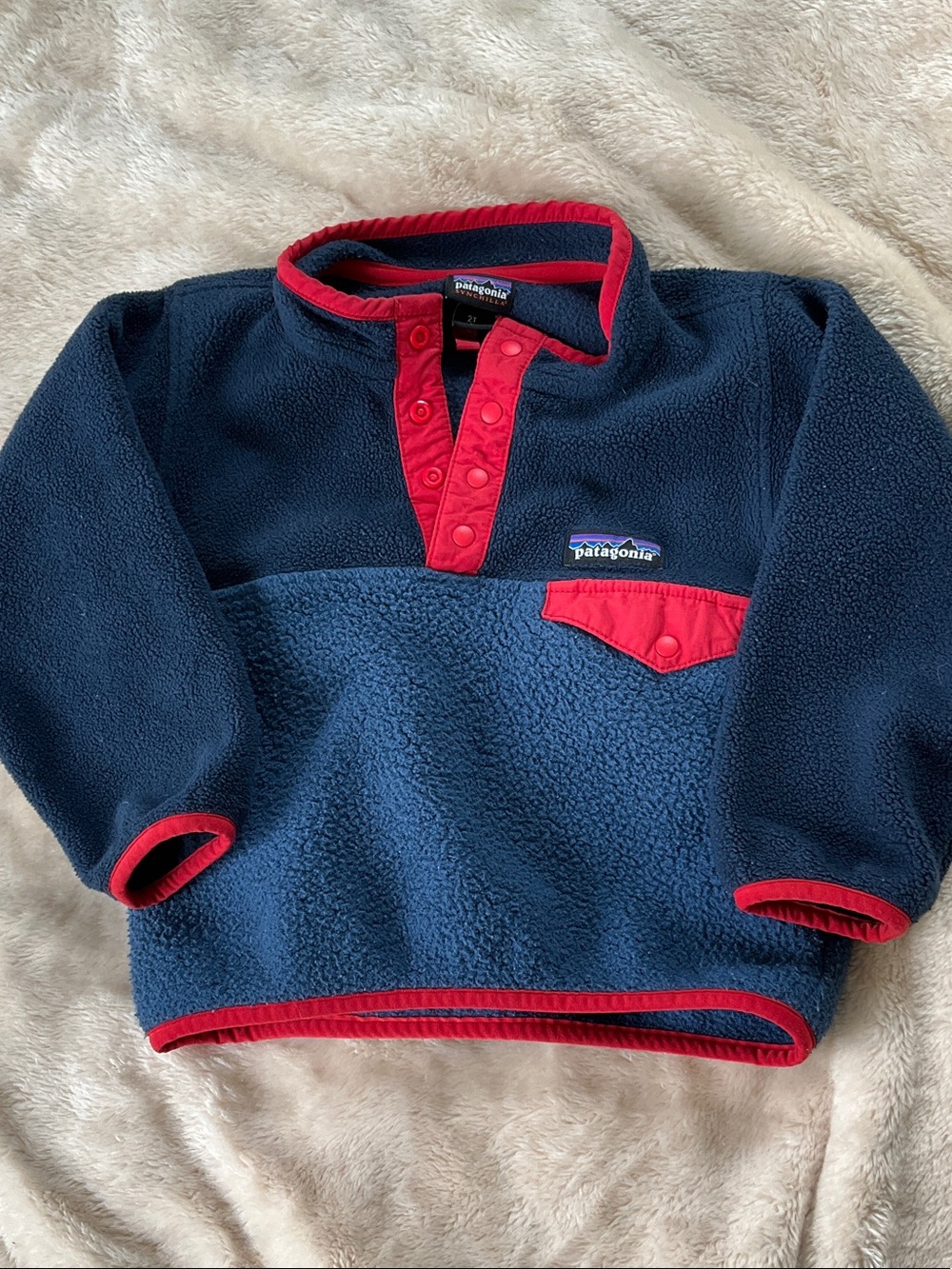 Patagonia toddler Navy Fleece Pullover with Red Trim